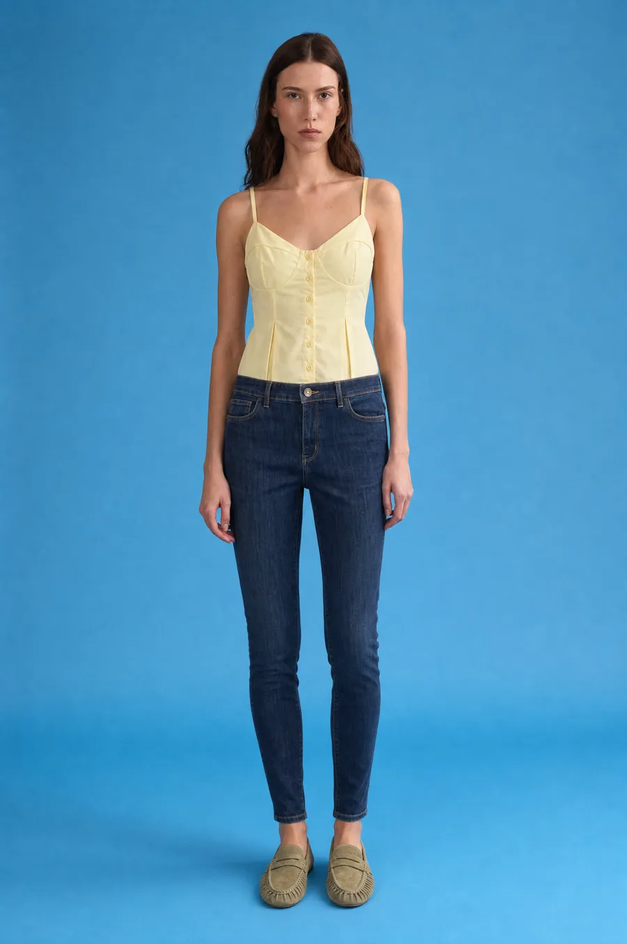 Taliya result 3 for Delucca: on-model shot on a blue backdrop